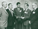 Kennedy with Belanger and other leaders at the 1958 Democratic State Convention