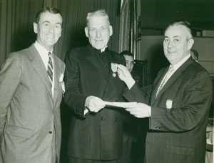 Kenneth Kelley, unidentified priest, and Kenneth Kelley