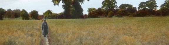 Frank Waugh image of woman standing in a field