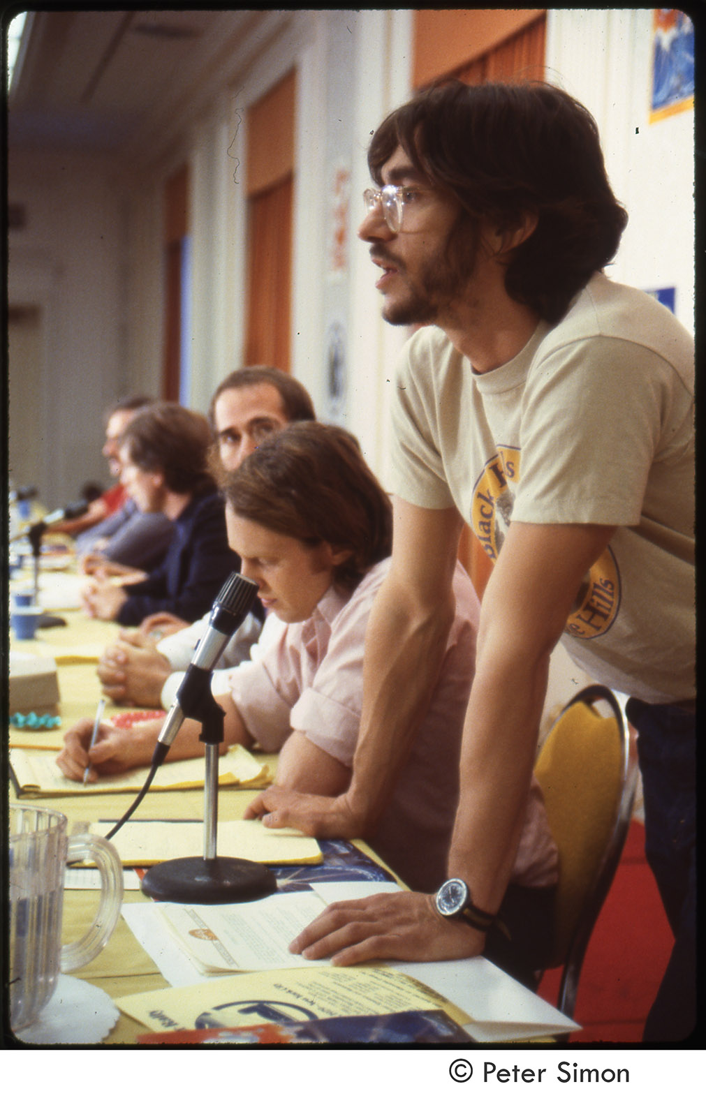 Depiction of Harvey Wasserman at MUSE press conference, 1979