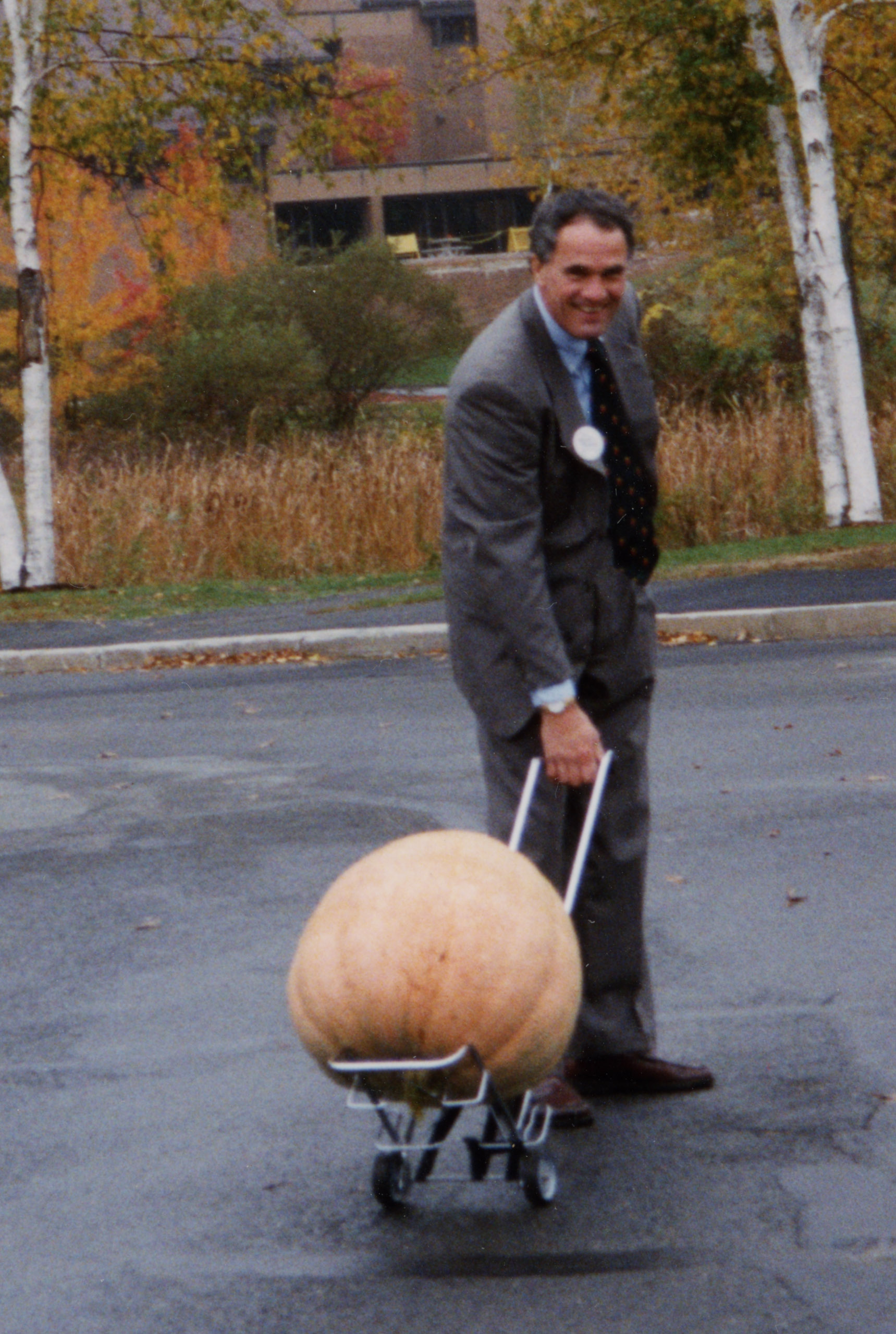 Depiction of Jay Healy with a pumpkin, Greenfield, Mass., 1998
