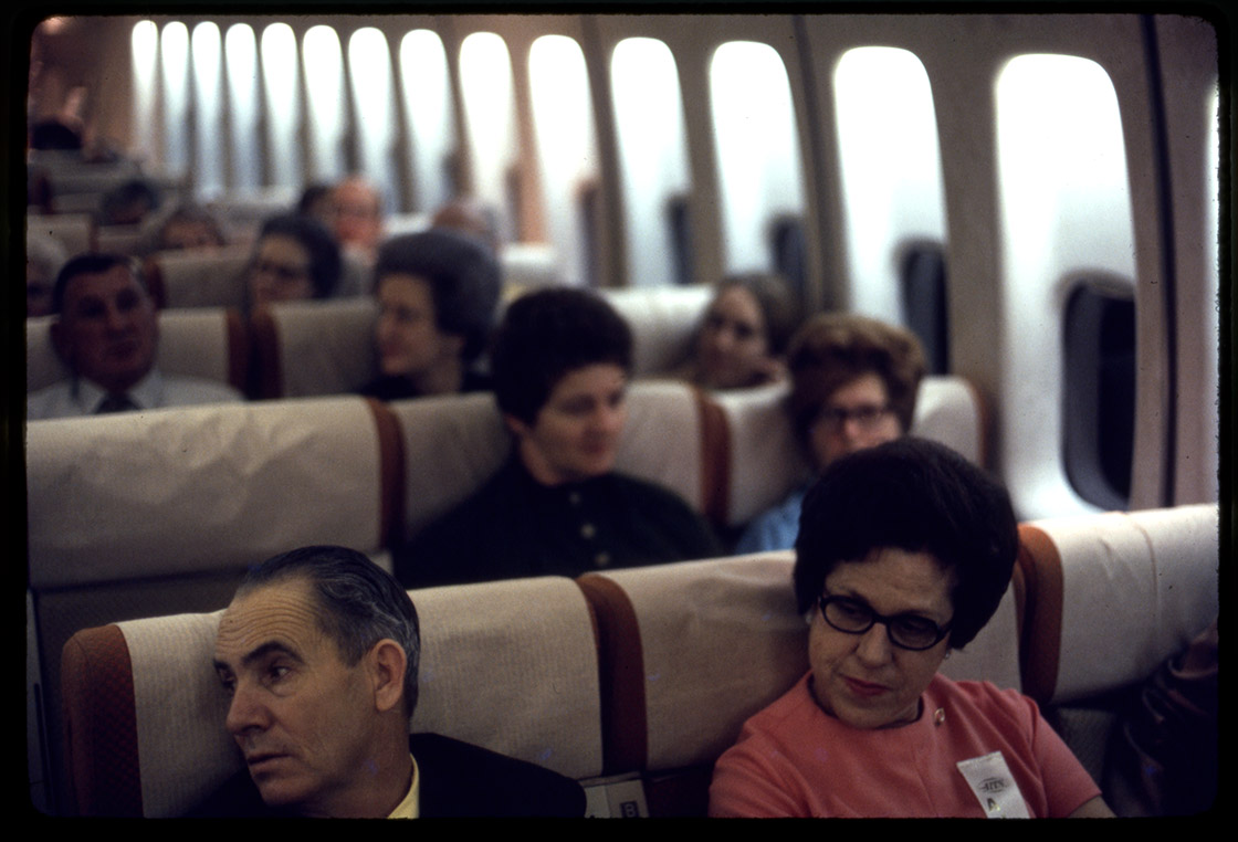 Depiction of Passengers on a plane, ca.1973