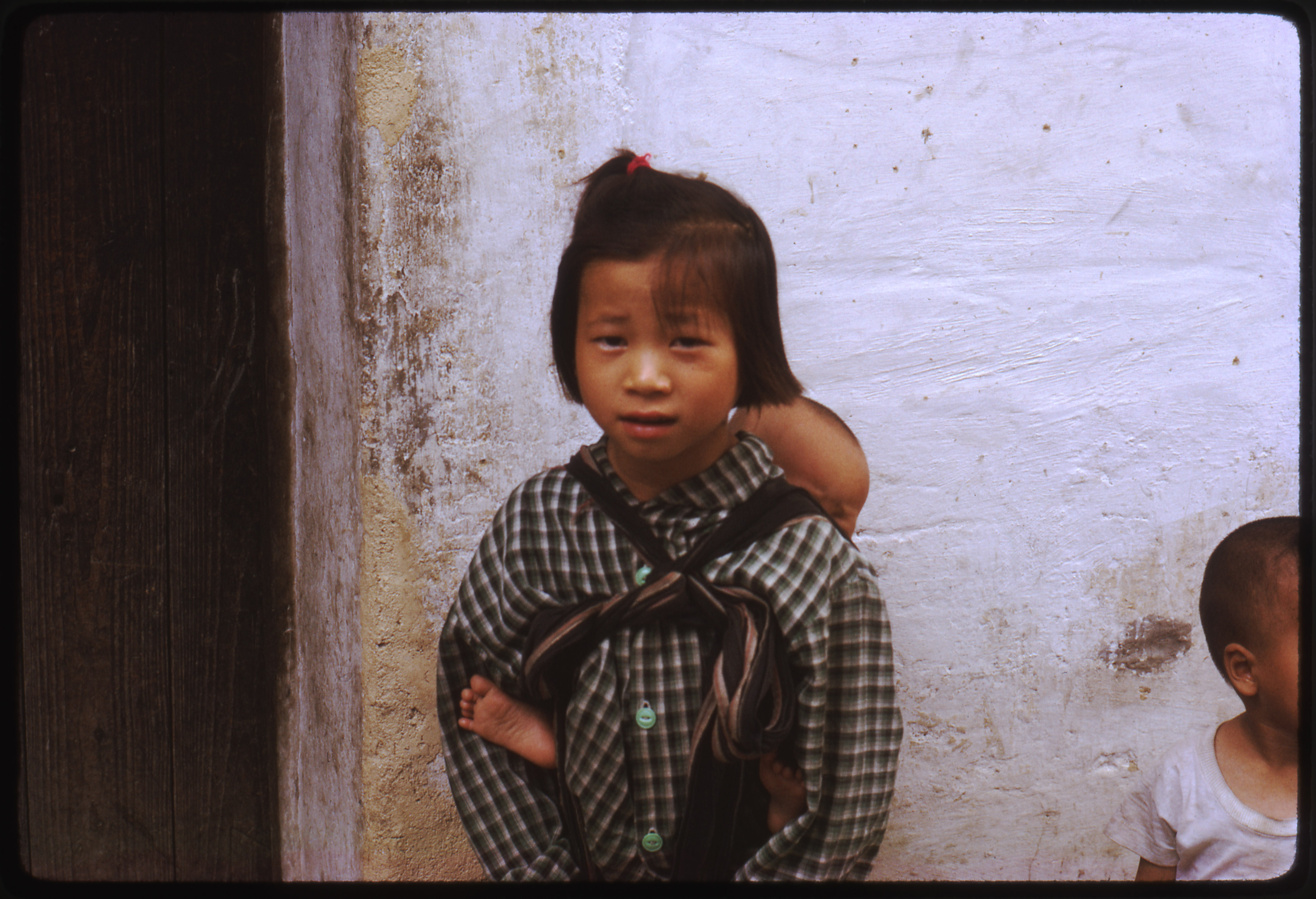 Depiction of Chinese girl and infant, 1972